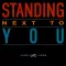 Standing Next to You